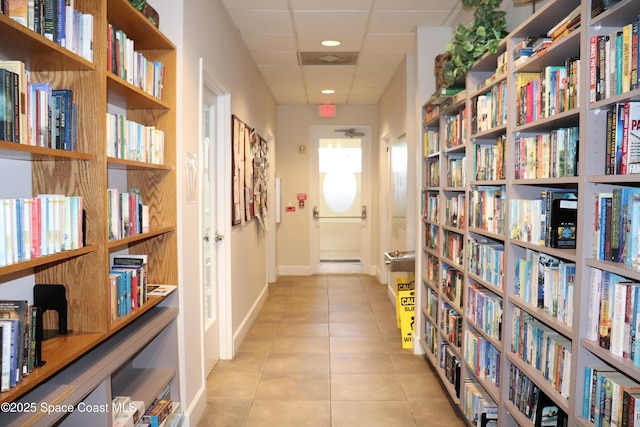 4889 Worthington Cir, Rockledge, FL 32955 - corridor with tile patterned flooring and baseboards