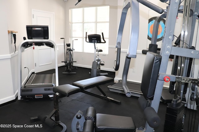 4889 Worthington Cir, Rockledge, FL 32955 - workout area featuring baseboards