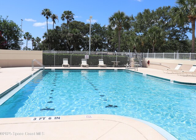 4889 Worthington Cir, Rockledge, FL 32955 - pool featuring fence