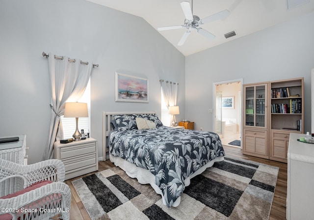 4889 Worthington Cir, Rockledge, FL 32955 - bedroom with high vaulted ceiling, visible vents, and wood finished floors