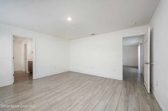 empty room featuring light hardwood / wood-style floors