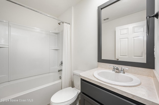 full bathroom featuring toilet, shower / bath combo, and vanity