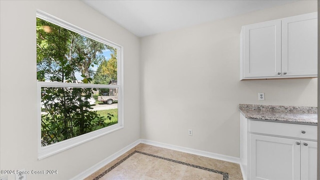 interior space with light tile patterned floors