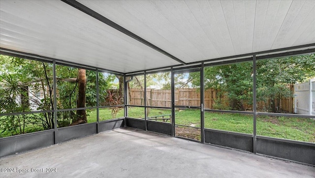 unfurnished sunroom featuring a healthy amount of sunlight