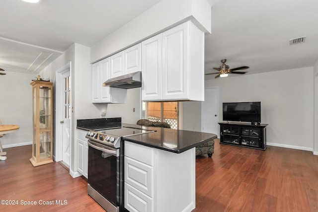 kitchen with ceiling fan, dark wood-style flooring, visible vents, stainless steel electric stove, and under cabinet range hood