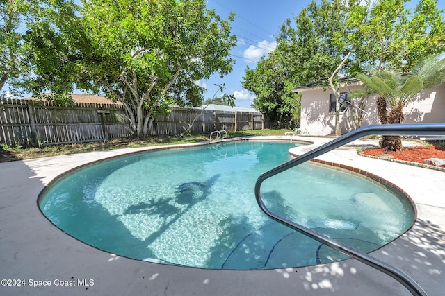 view of pool with a fenced in pool and a fenced backyard