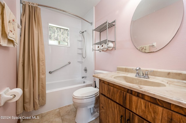 full bathroom featuring toilet, shower / bath combo, vanity, and tile patterned floors