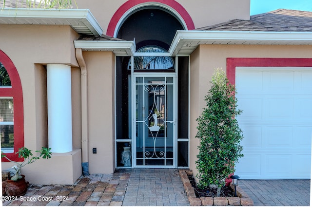 entrance to property with a garage