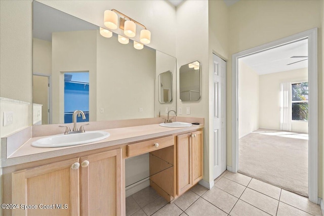 bathroom featuring vanity, ceiling fan, and tile patterned floors