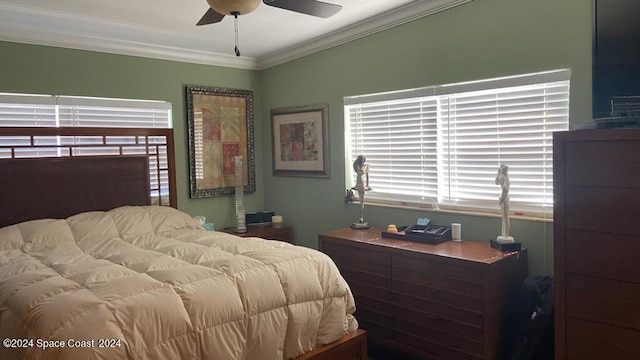 bedroom with crown molding and ceiling fan