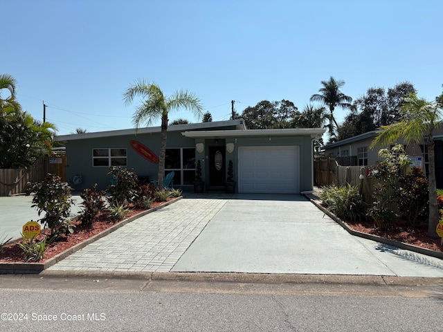 view of front of home featuring a garage