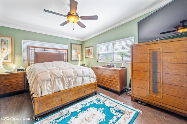 bedroom featuring ornamental molding, dark hardwood / wood-style floors, and ceiling fan