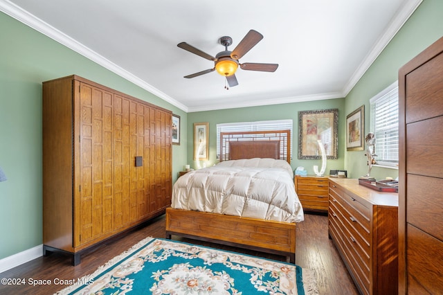 bedroom featuring ornamental molding, multiple windows, dark hardwood / wood-style floors, and ceiling fan