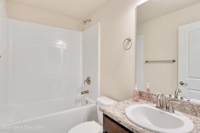 full bathroom featuring bathtub / shower combination, vanity, and toilet