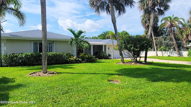 view of front of house with a front yard