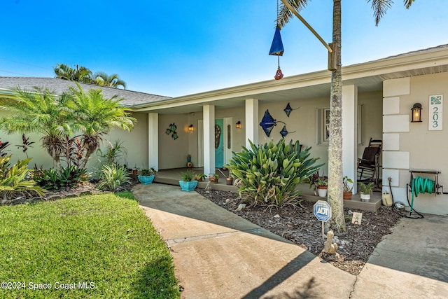 entrance to property with covered porch