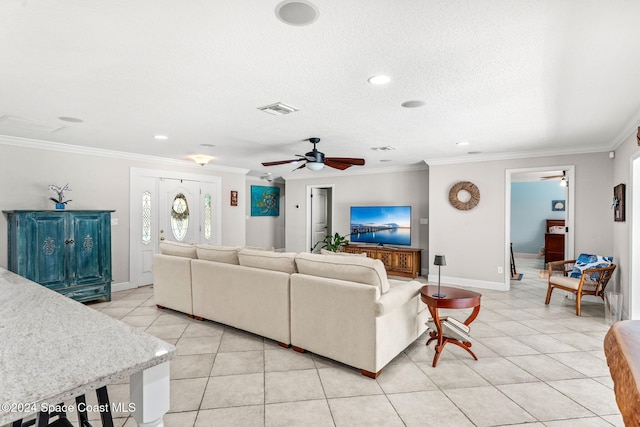 living room featuring ceiling fan, a textured ceiling, crown molding, and light tile patterned floors