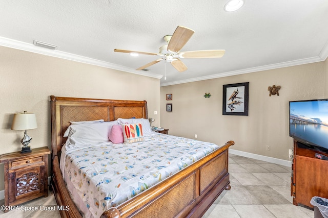 tiled bedroom featuring ornamental molding, a textured ceiling, and ceiling fan