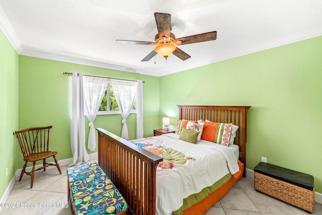 bedroom featuring ceiling fan, light tile patterned floors, and ornamental molding