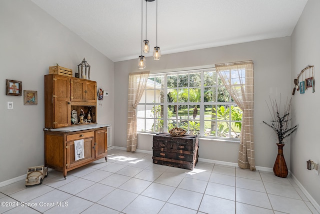 living area featuring light tile patterned flooring