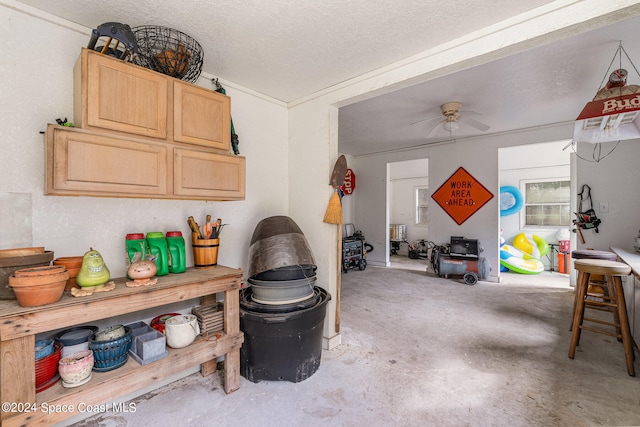 garage with ceiling fan