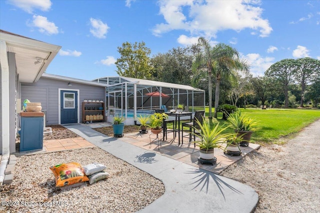 view of patio featuring glass enclosure and a pool