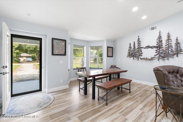 dining space featuring light hardwood / wood-style flooring