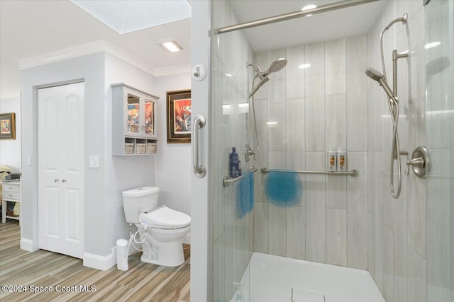 bathroom with walk in shower, wood-type flooring, toilet, a skylight, and crown molding