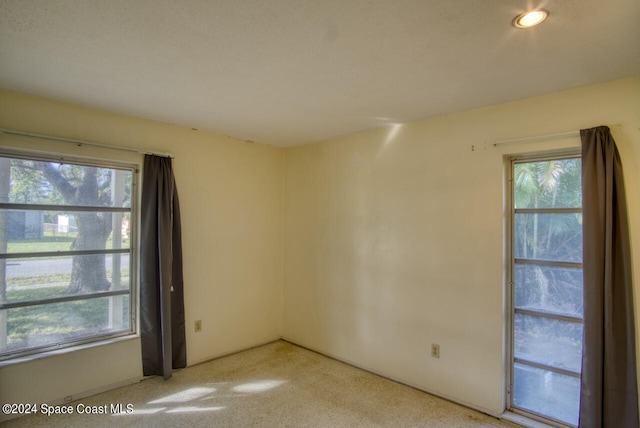 view of carpeted spare room