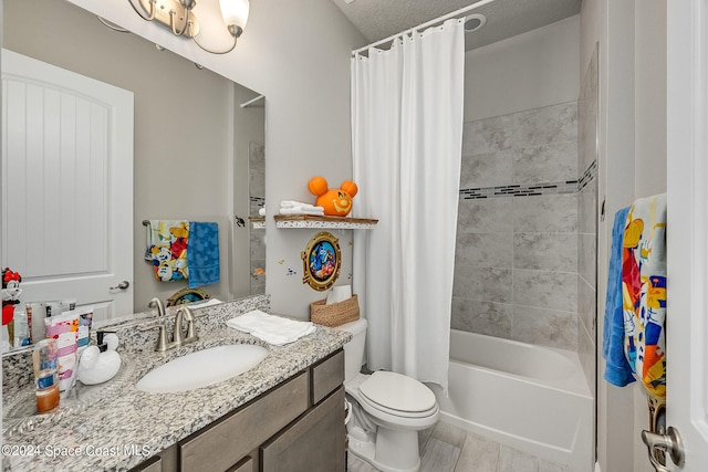 full bathroom with vanity, shower / bath combo with shower curtain, toilet, and a textured ceiling