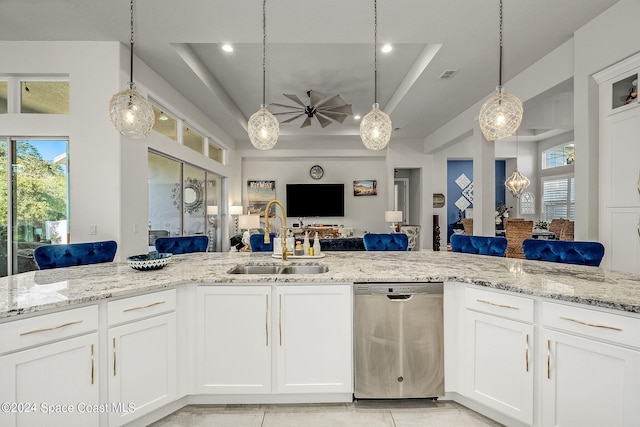 kitchen with dishwasher, pendant lighting, white cabinets, and sink