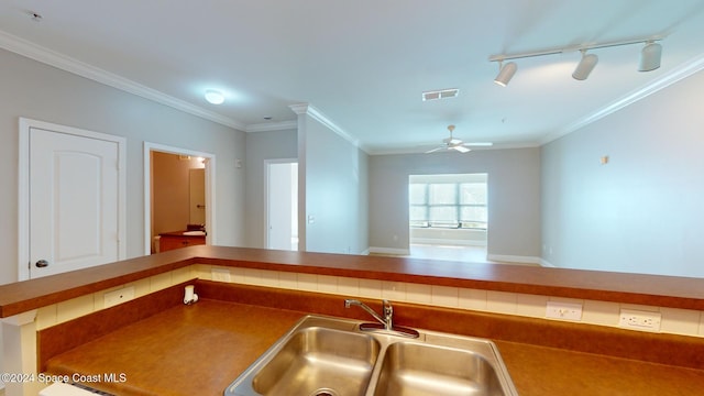 6461 Borasco Dr Unit 2805, Melbourne, FL 32940 - kitchen with a sink, crown molding, a ceiling fan, track lighting, and open floor plan