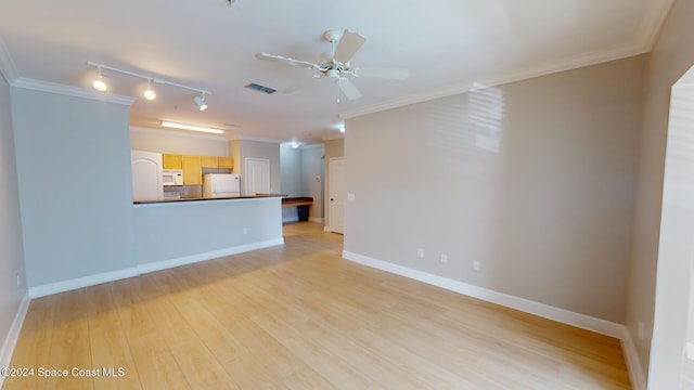 unfurnished living room featuring ornamental molding, track lighting, light wood-type flooring, and ceiling fan