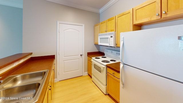 kitchen featuring white appliances, sink, backsplash, ornamental molding, and light hardwood / wood-style flooring