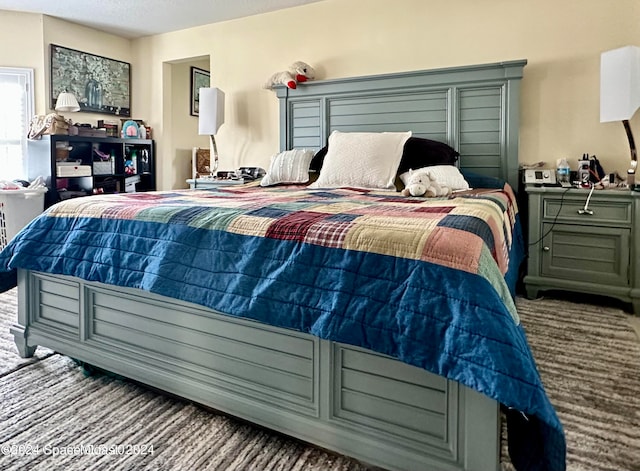 bedroom featuring carpet flooring