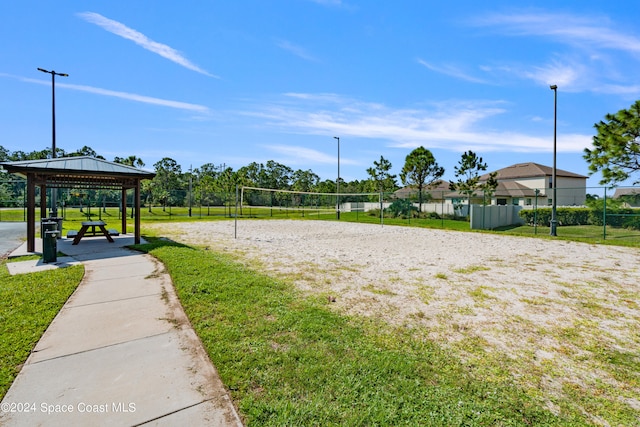 view of home's community with a gazebo, a yard, and volleyball court