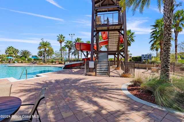 view of pool featuring a patio