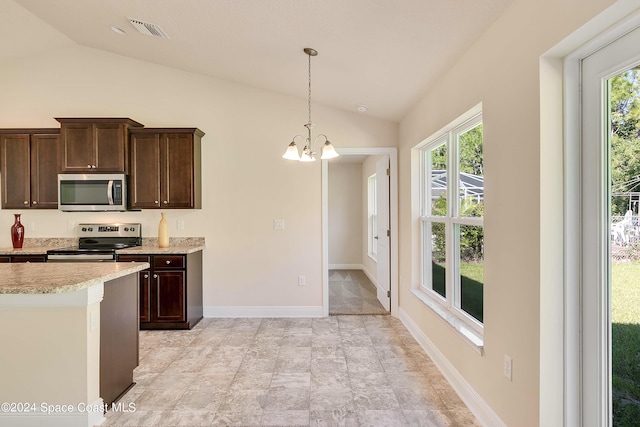 kitchen with dark brown cabinetry, stainless steel appliances, and vaulted ceiling