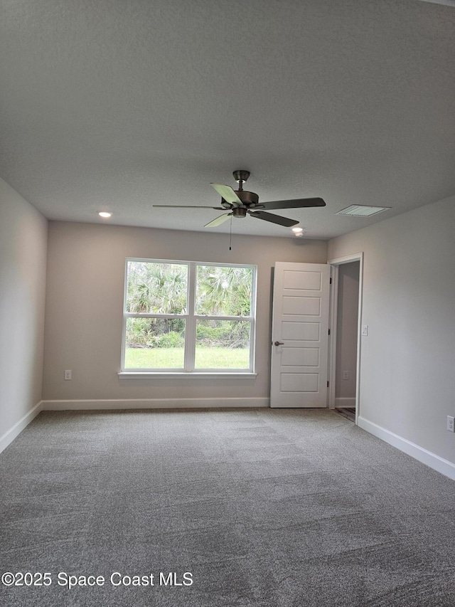 713 Degroodt Rd SW, Palm Bay, FL 32908 - carpeted spare room with ceiling fan and baseboards