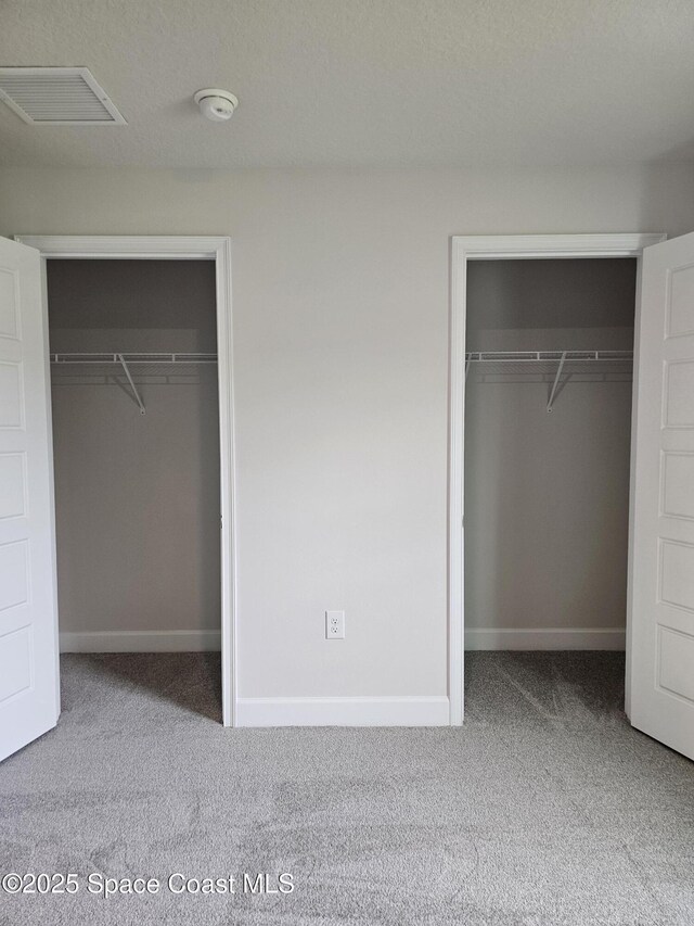 713 Degroodt Rd SW, Palm Bay, FL 32908 - unfurnished bedroom with carpet floors and baseboards