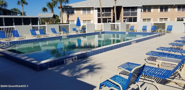 981 Sonesta Ave NE Unit 203, Palm Bay, FL 32905 - pool with fence