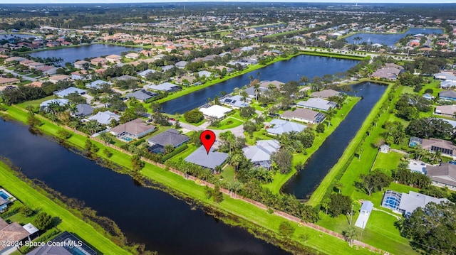 drone / aerial view featuring a water view