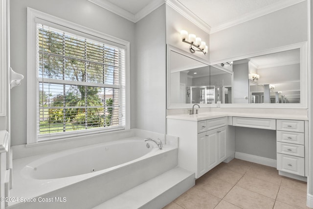 bathroom with vanity, ornamental molding, a wealth of natural light, and shower with separate bathtub