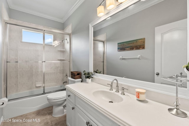 full bathroom featuring shower / bath combination with glass door, toilet, vanity, ornamental molding, and tile patterned flooring