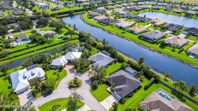 bird's eye view with a water view