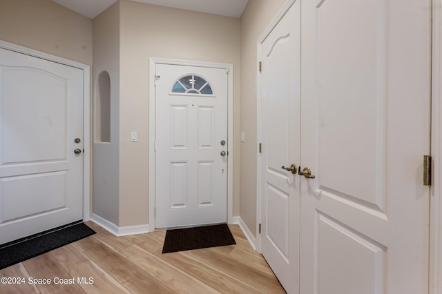 entrance foyer with light wood-type flooring