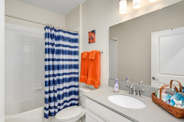 full bathroom with vanity, shower / bath combo with shower curtain, and toilet