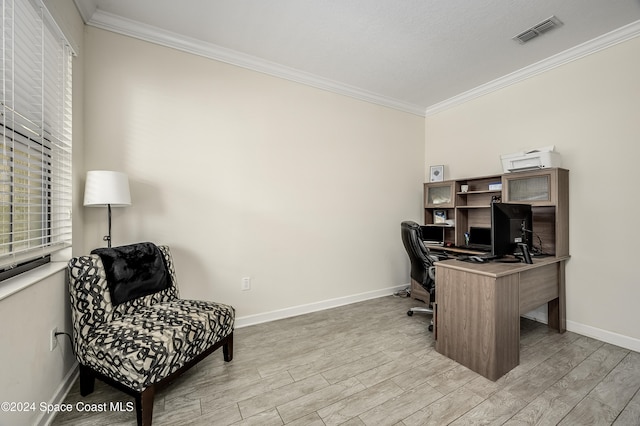 office featuring ornamental molding and light hardwood / wood-style floors