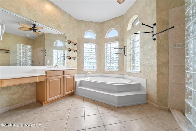 bathroom with ceiling fan, tile patterned flooring, vanity, and independent shower and bath