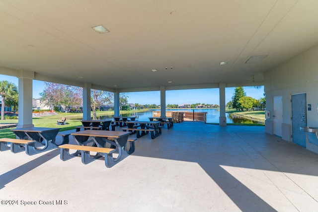 view of patio featuring a water view